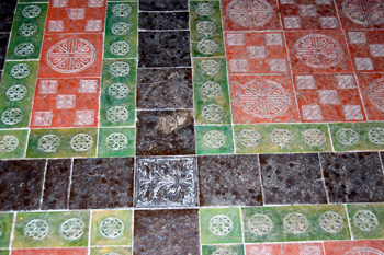 Tiles on the floor of the chancel August 2010